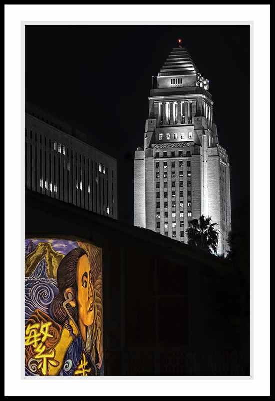 Woman looking at Los Angeles City Hall.
